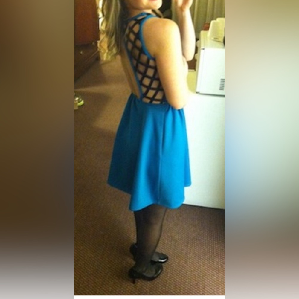 Material girl blue and black faux leather cut out dress, low back. Size Small